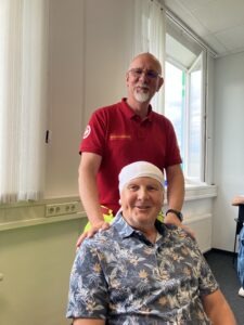 Erste Hilfe Kurs - Sanitäter und "Patient"
