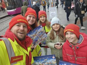 Samariter bei Verkaufsstand am Taubenmarkt Linz